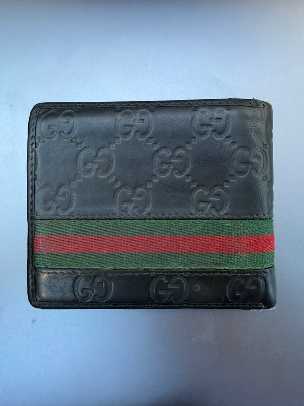 Gucci Signature Black Leather Embossed Web Logo Bifold Wallet